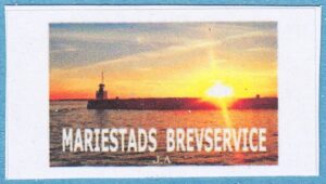 Lokalpost MARIESTAD Nr 19 2023-05-xx solnedgång vid fyr vid Sjötorp, Göta kanal